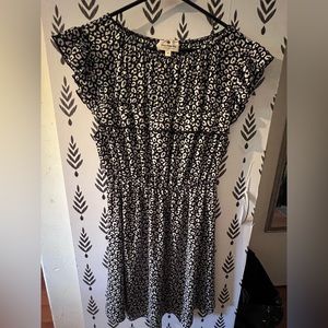 Medium short sleeve black and white leopard print knee length dress. Never worn